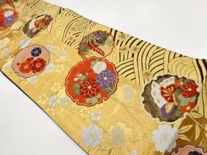 雪輪に花々・蝶・波模様織出し袋帯